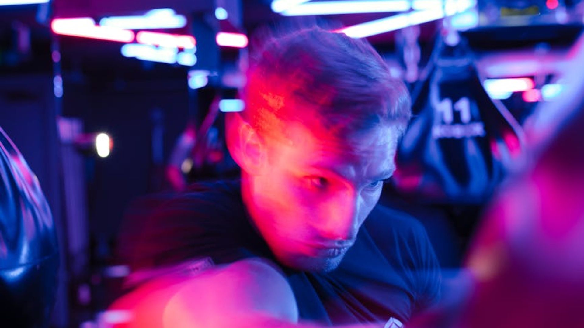 Atmospheric cardio gym with neon lighting highlights