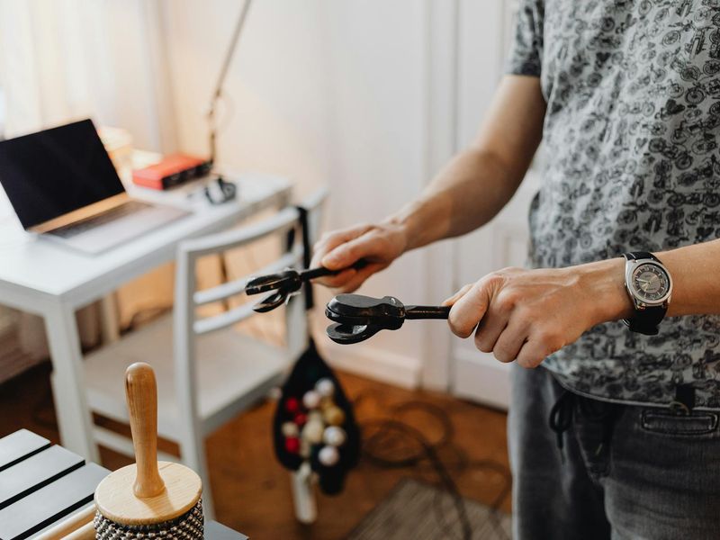 Person performing a dynamic rhythmic stretch in modern interior
